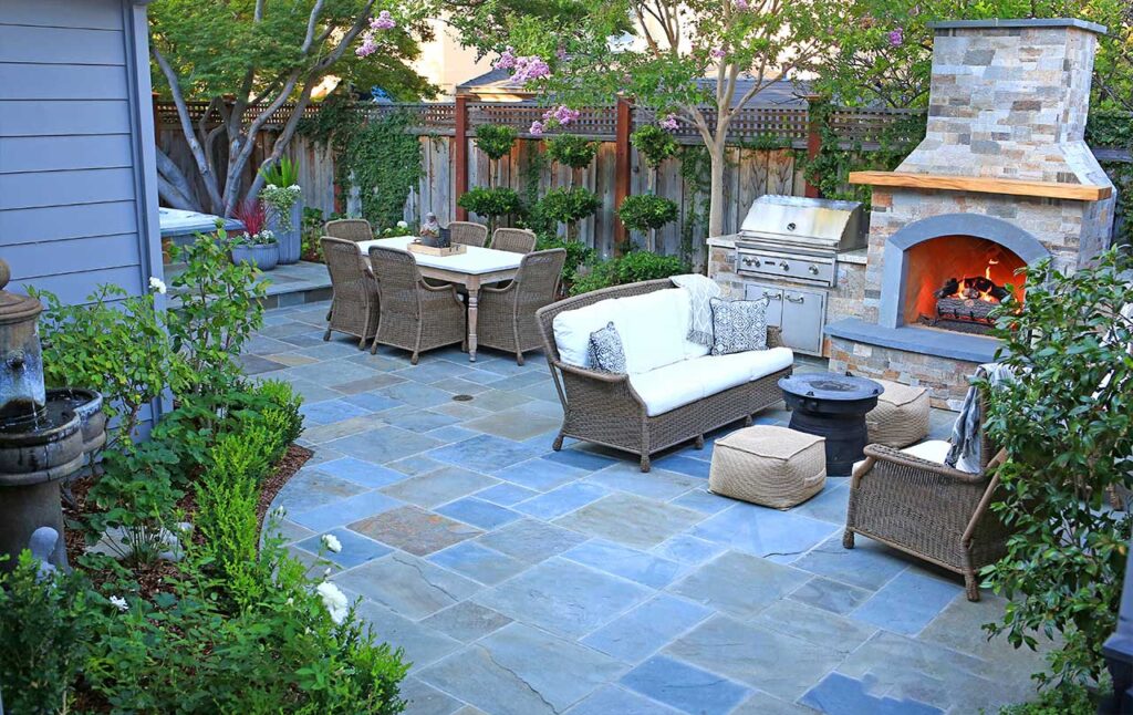 Patio with seating arrangements and fire feature