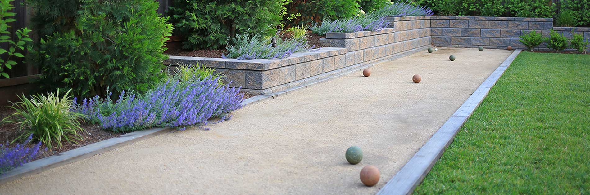 Bocce ball court and landscaped yard