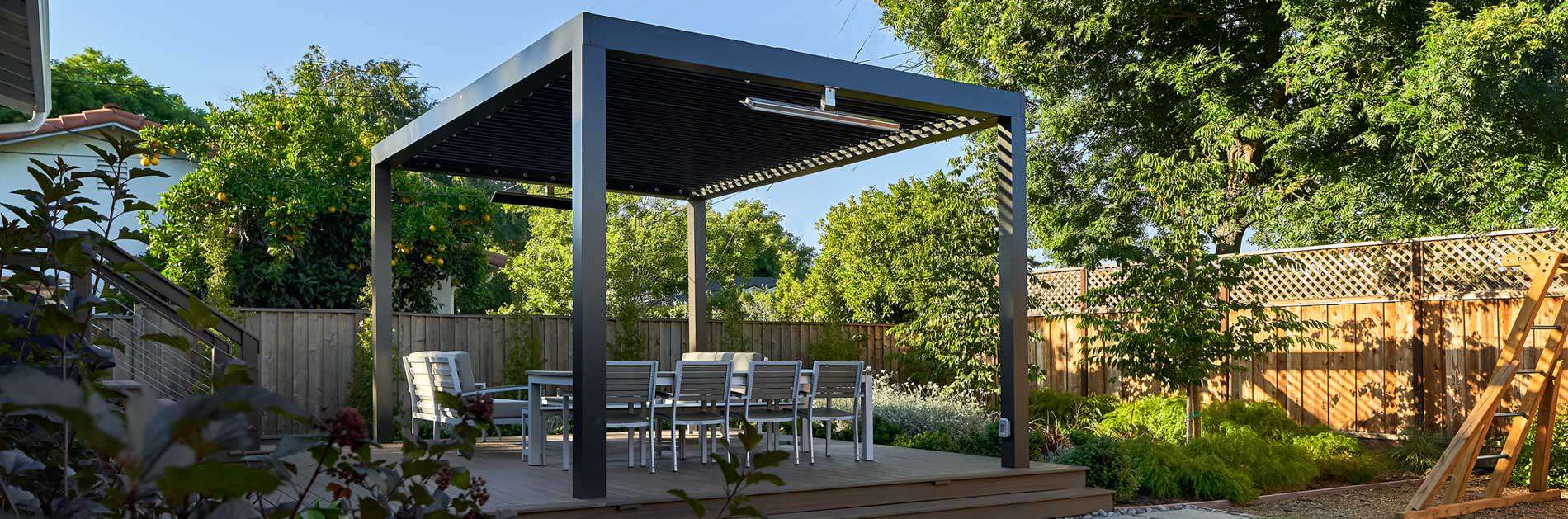Backyard pergola-covered patio with seating